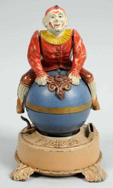 Appraisal: Cast Iron Clown on Globe Mechanical Bank Manufactured by J