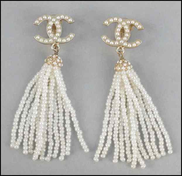 Appraisal: PAIR OF CHANEL FAUX PEARL EARCLIPS with Chanel box Length