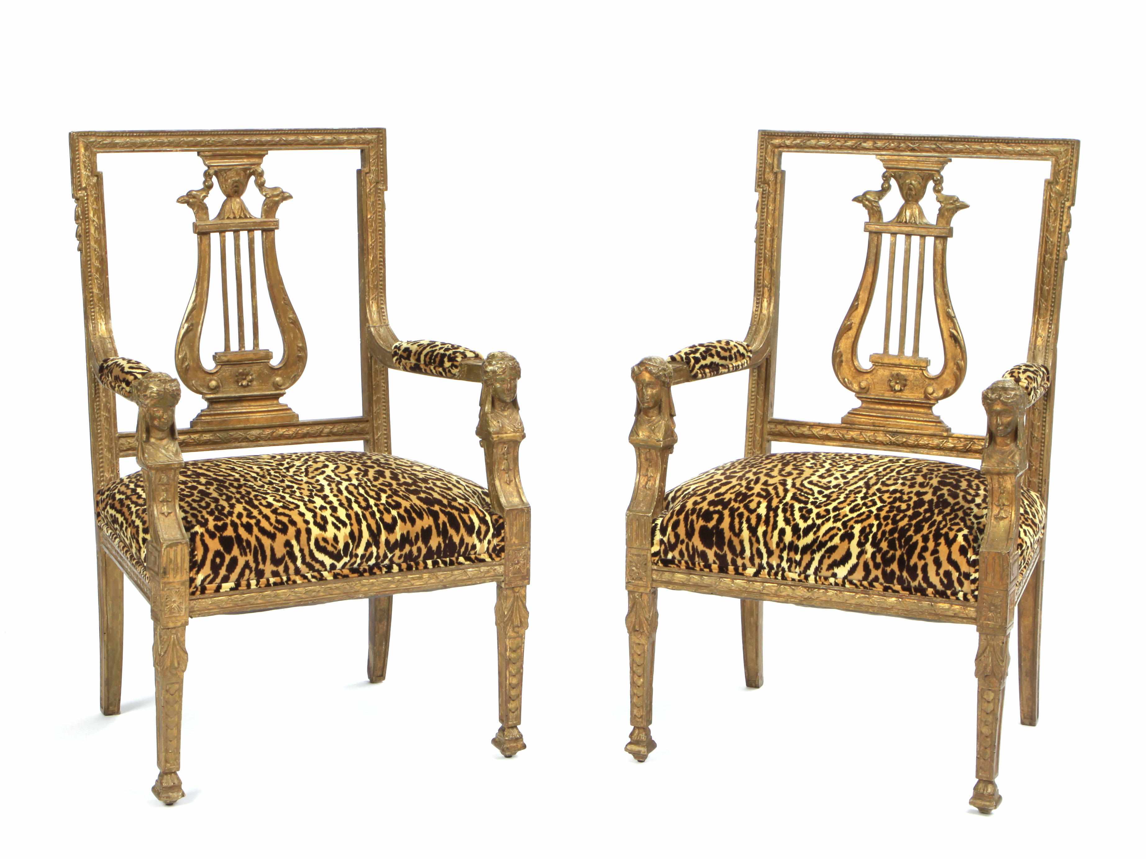 Appraisal: A pair of Italian Neoclassical style upholstered giltwood armchairs height