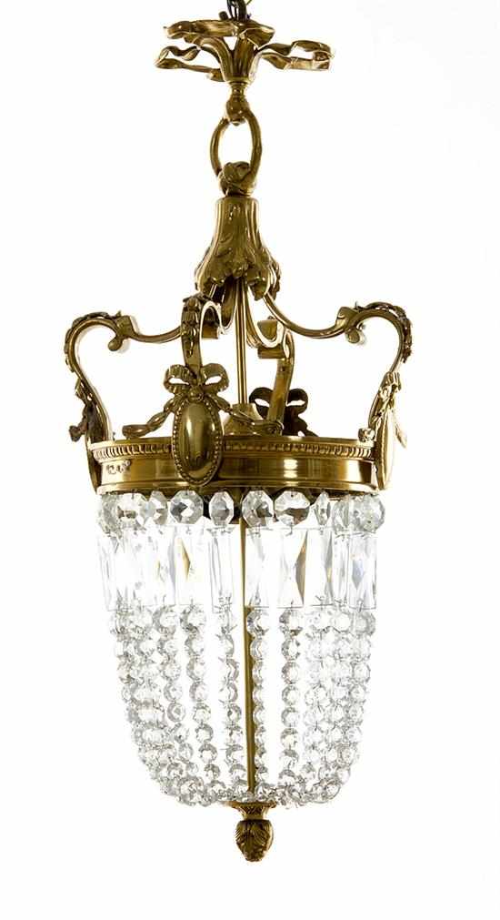 Appraisal: Gilt-metal and crystal basket chandelier ribbon crown supporting prism draped