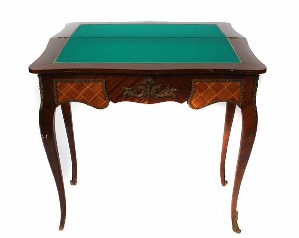 Appraisal: A Louis XV style marquetry inlaid games table height in