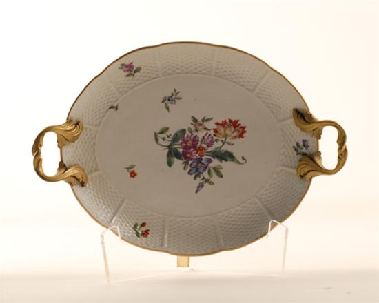 Appraisal: An Ormolu Mounted German Porcelain Dish oval with handpainted flowers