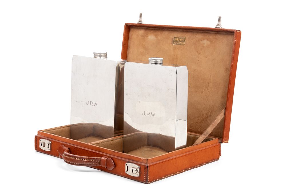 Appraisal: A Leather-Cased Set of Silver-Plate Flasks Retailed by Abercrombie Fitch