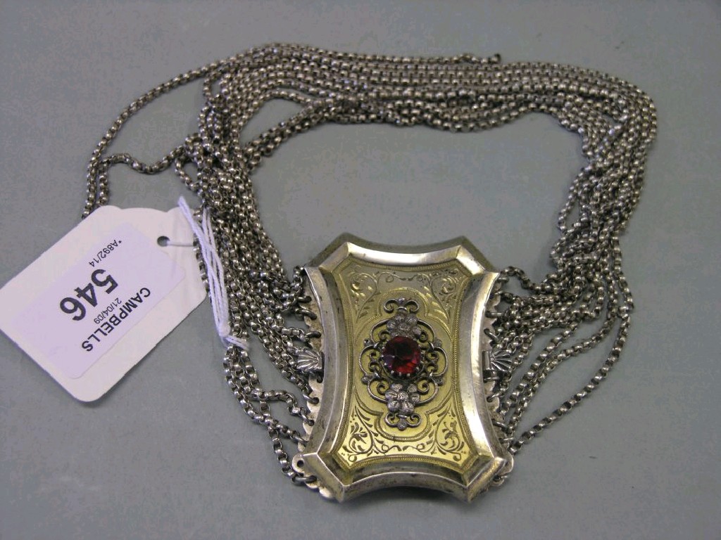 Appraisal: An Austrian silver choker engraved decoration set central red stone