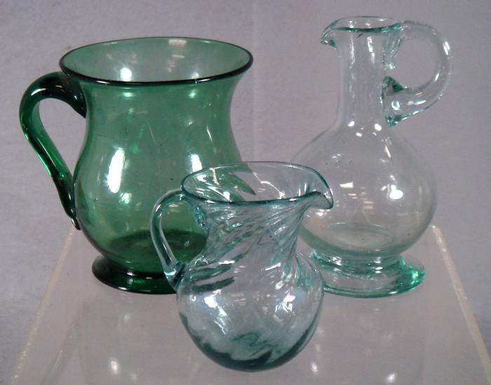 Appraisal: blown glass aquamarine pitchers small swirled h baluster mug h