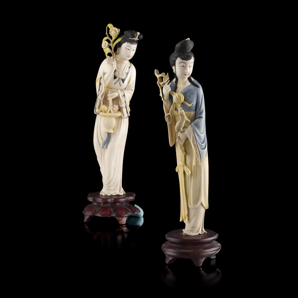 Appraisal: YTWO PAINTED IVORY FIGURES OF FEMALE IMMORTALS REPUBLIC PERIOD each