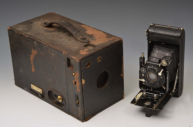 Appraisal: AN OLD BOX TYPE CAMERA together with a further camera