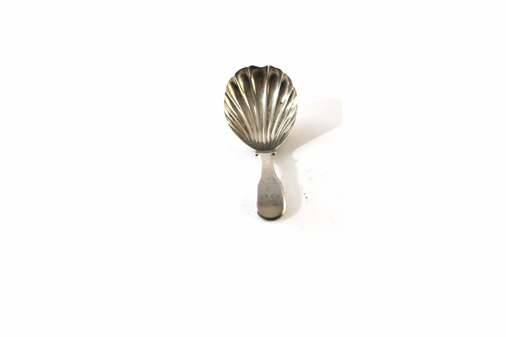 Appraisal: A George III silver fiddle pattern caddy spoon William Eaton