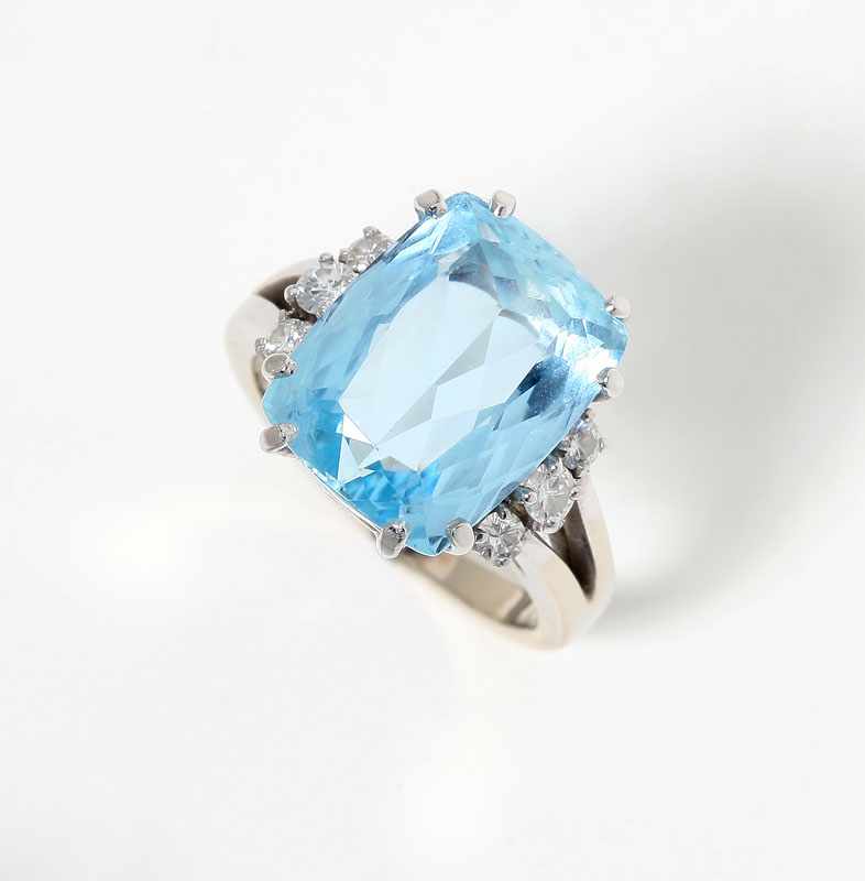 Appraisal: Tests for K white gold centering a rectangular mixed-cut aquamarine