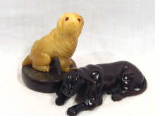 Appraisal: A wooden netsuke in the form of a sitting dog