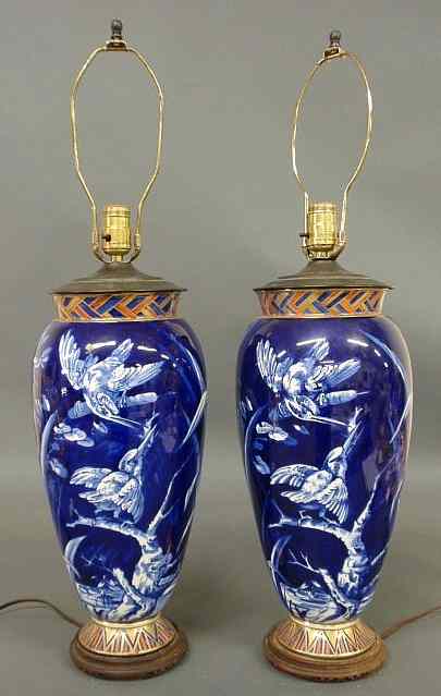 Appraisal: Large pair of porcelain table lamps th c decorated with