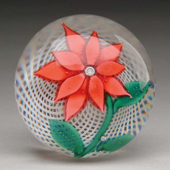 Appraisal: ANTIQUE SANDWICH GLASS POINSETTIA PAPERWEIGHT Poinsettia having red petals with