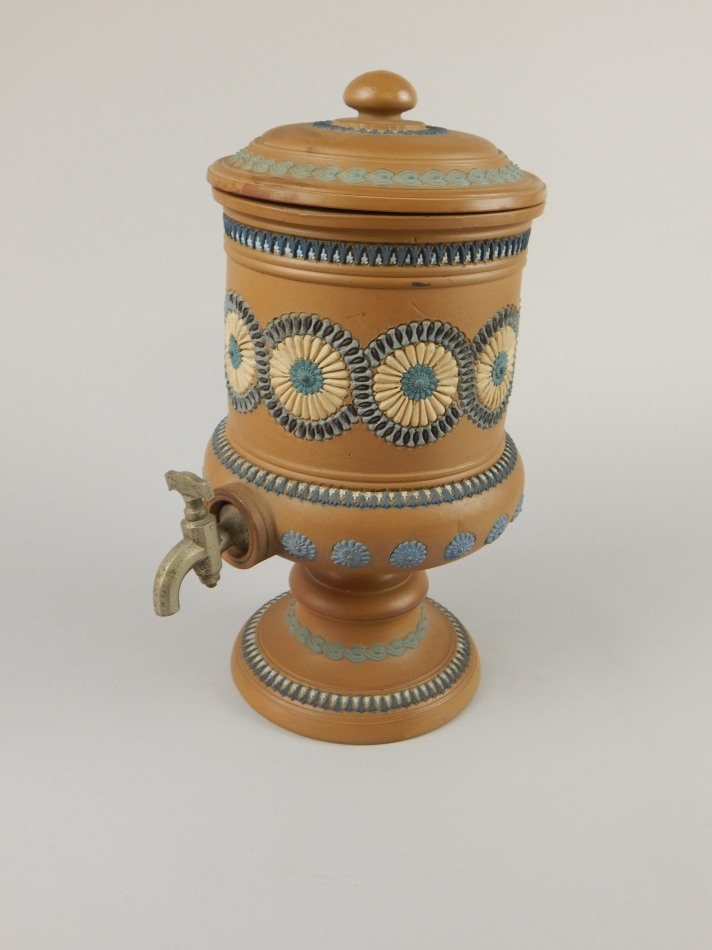 Appraisal: A Doulton Silicon Ware urn decorated with raised bands of