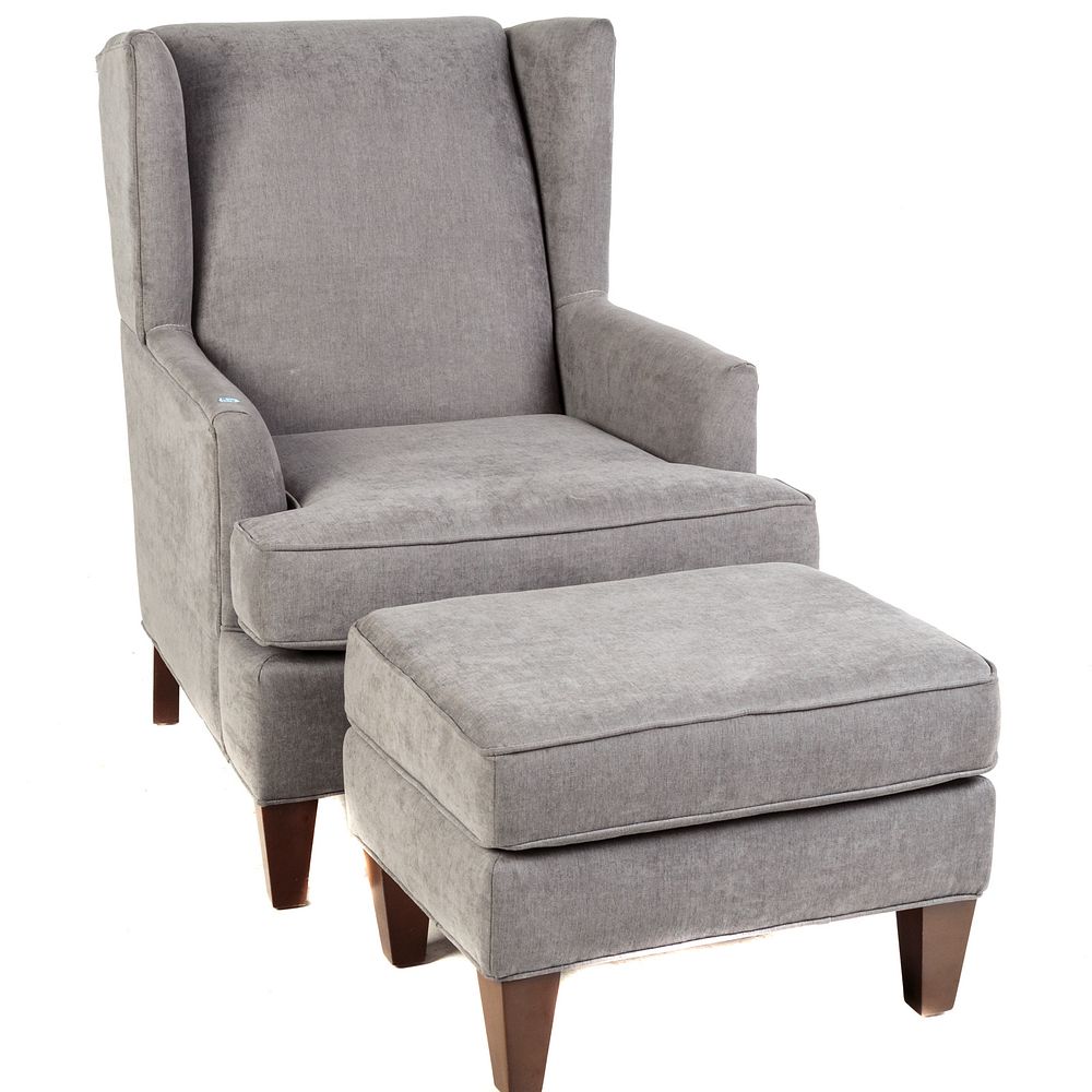 Appraisal: Contemporary Upholstered Wing Chair Ottoman With custom upholstery Chair in