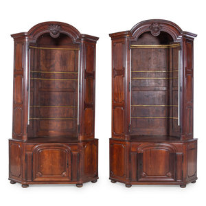 Appraisal: A Pair of Portuguese Rosewood Corner Bookcases th Century Height