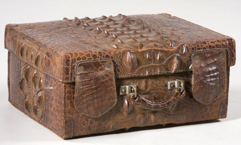 Appraisal: Gentleman's Traveling Case the alligator case holding silver lidded dresser