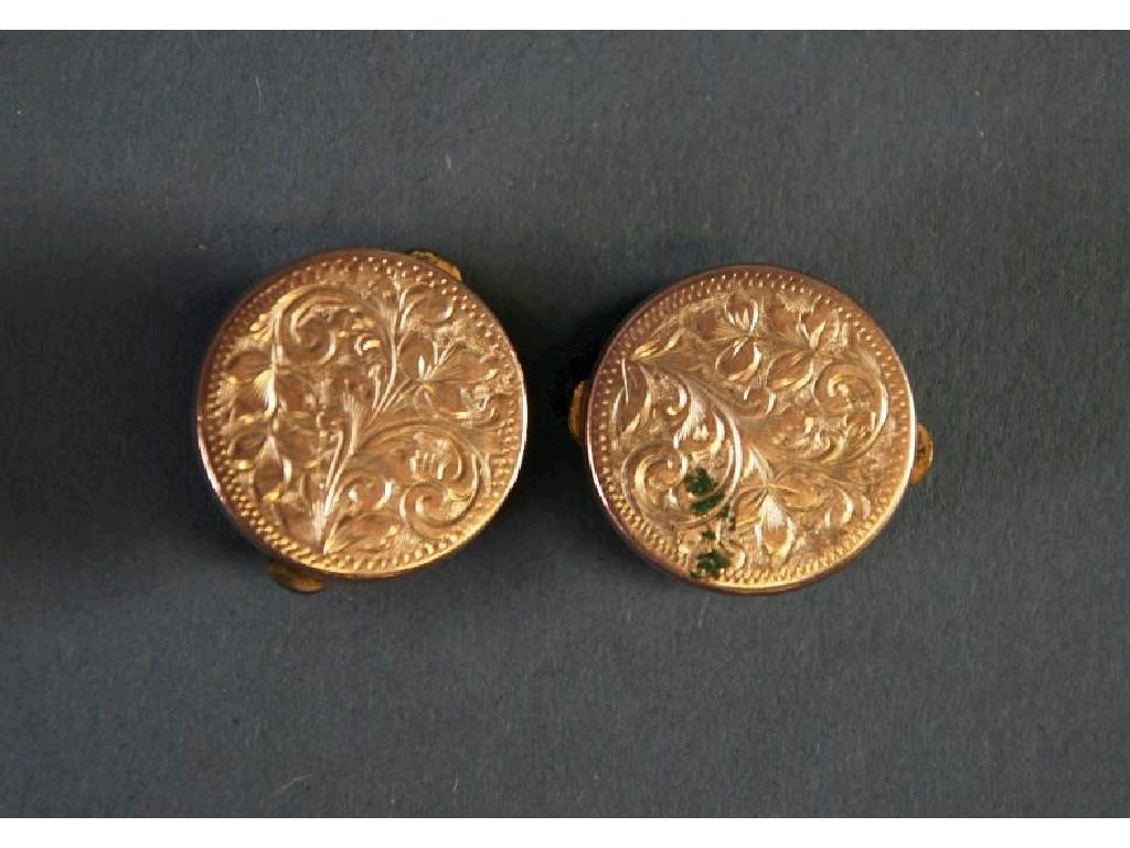 Appraisal: PAIR OF VICTORIAN ROLLED GOLD PATENT LARGE DRESS STUD foliate