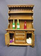 Appraisal: SONIA MESSER CHINA HUTCH WITH FLATWARE SONIA MESSER CHINA HUTCH