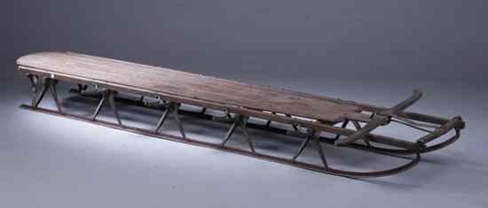 Appraisal: FLEXIBLE FLYER FOUR-MAN SLED WOOD PLANK DECK OVER METAL RAILS