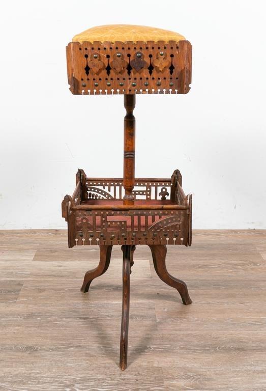 Appraisal: Fretwork wood sewing stand with spool holder in the top