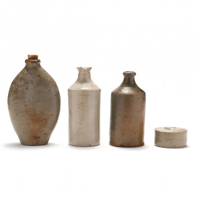 Appraisal: FOUR AMERICAN UTILITARIAN POTTERY ITEMS th-early th century salt glazed