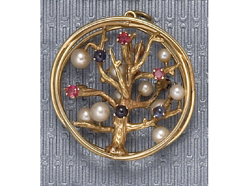 Appraisal: GOLD CHARM k yellow gold tree of life charm with