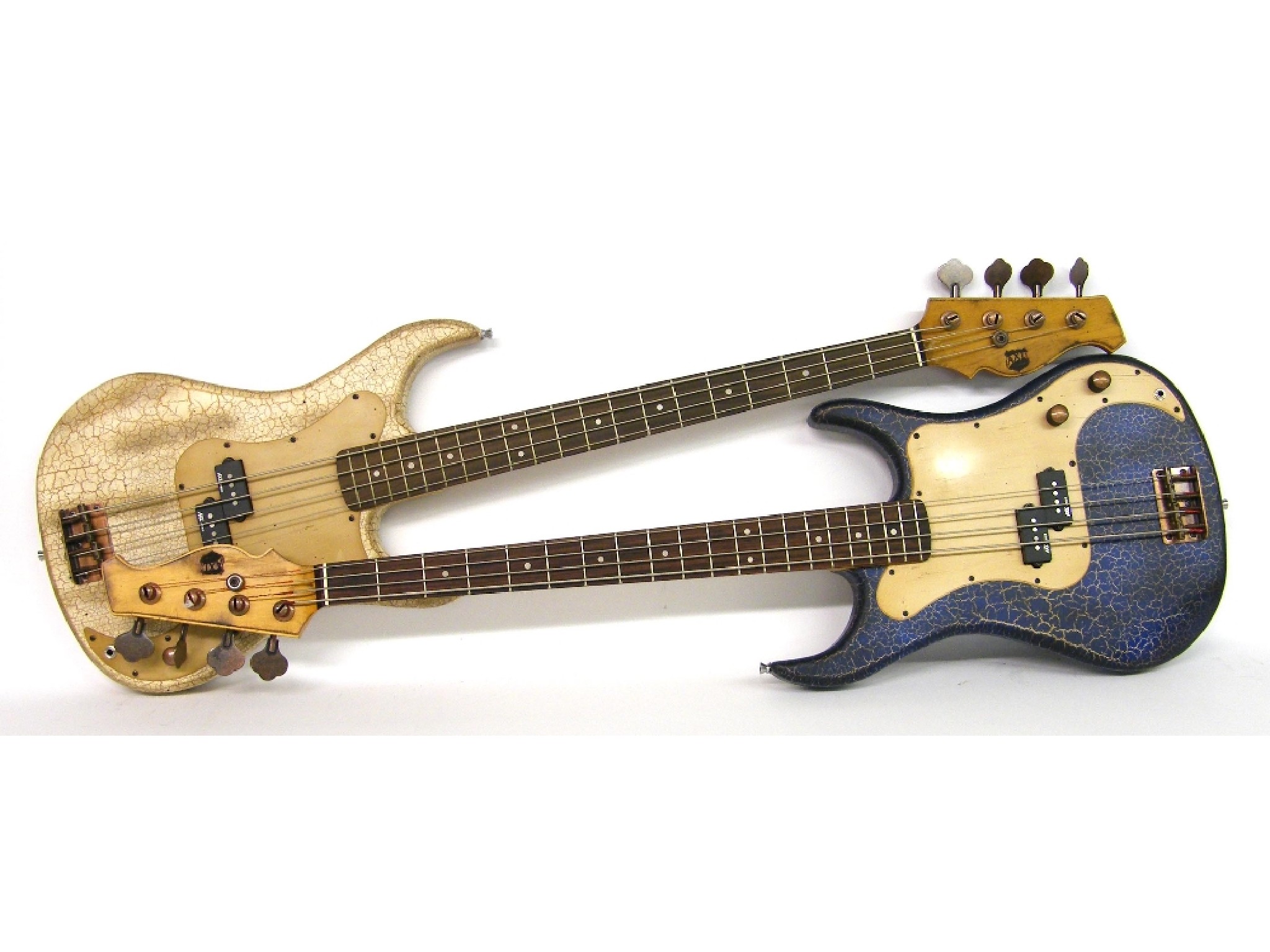 Appraisal: Two AXL bass guitars with distressed crackle finishes one in