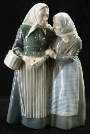 Appraisal: A Royal Copenhagen figure modelled as a pair of old