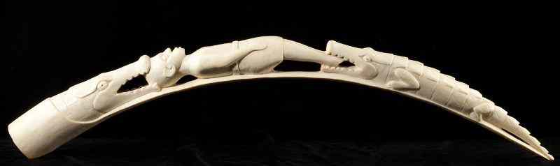 Appraisal: African Carved Ivory Tuskthe bridge form depicts a woman being