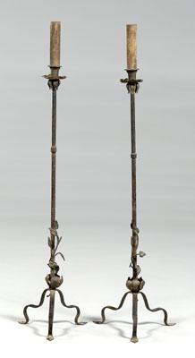 Appraisal: Pair iron torcheres tripod bases with applied leaves and vines