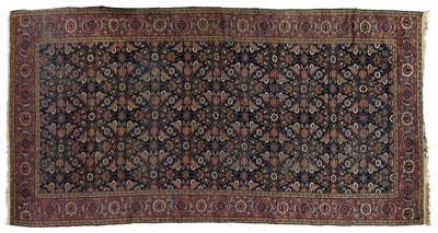 Appraisal: Tabriz rug repeating floral designs on dark blue field ft