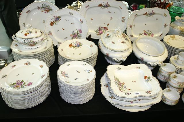 Appraisal: An extensive German dinner service in floral pattern