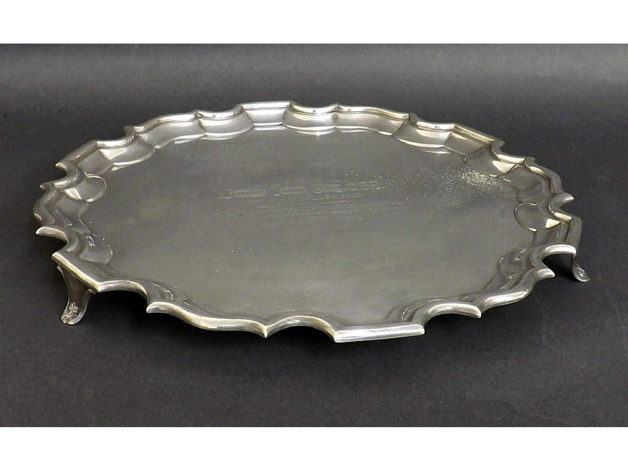 Appraisal: Early th century silver serpentine salver upon three splayed feet