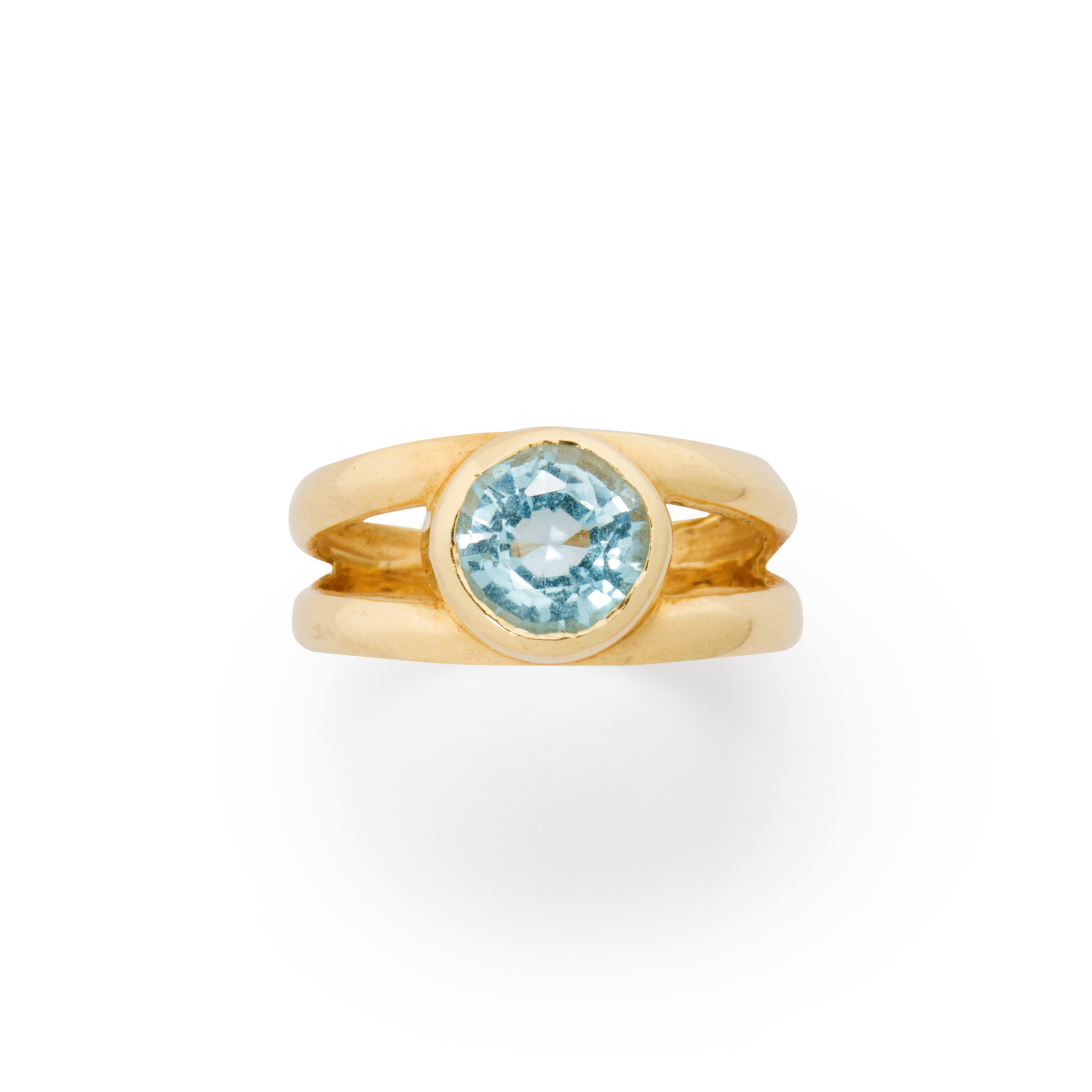 Appraisal: A BLUE TOPAZ AND FOURTEEN KARAT GOLD RING A blue