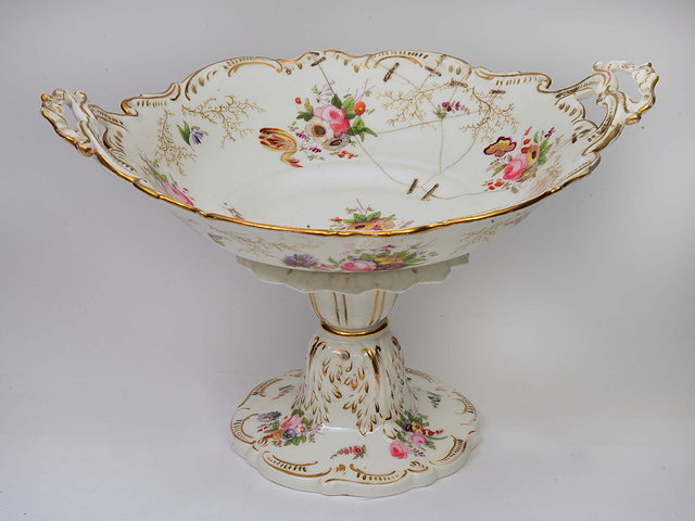 Appraisal: A VICTORIAN POSSIBLY WELSH WHITE GLAZED AND FLORALLY DECORATED TAZZA