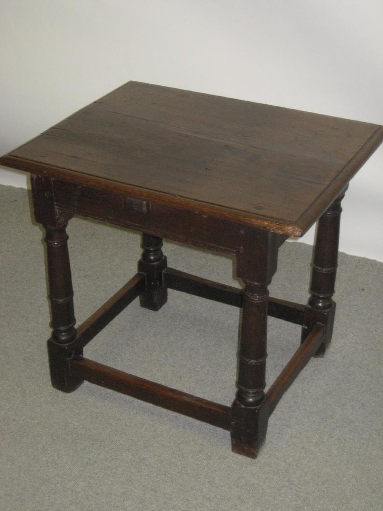 Appraisal: AN OAK SIDE TABLE part early th century of oblong