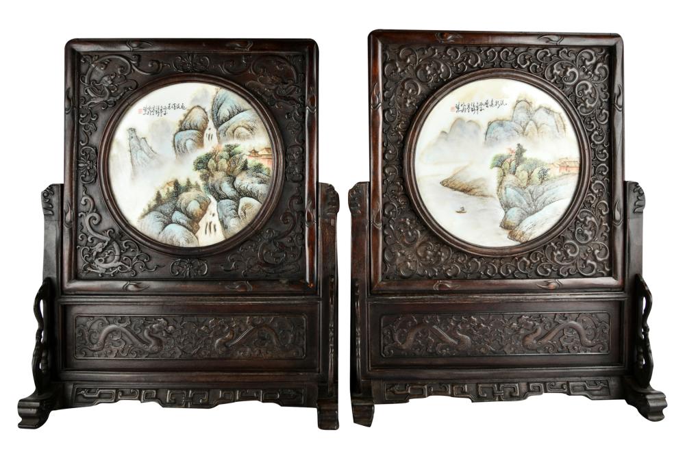 Appraisal: PAIR CHINESE CARVED WOOD TABLE SCREENSeach with inset round porcelain