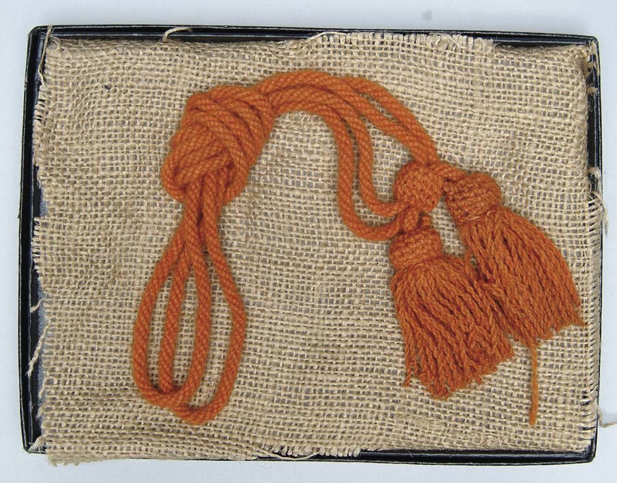 Appraisal: CIVIL WAR DRAGOON HAT CORD Rarely encountered orange-colored worsted enlisted