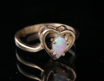 Appraisal: A Delicate Opal And Yellow Gold Ladies' Ring A delicate