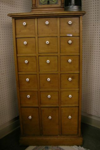 Appraisal: Antique oak apothecary cabinet drawers porcelain pulls older restoration