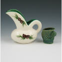 Appraisal: Rocky Mountain Pottery creamer with pine cone motif Marked with