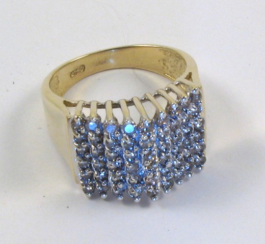 Appraisal: DIAMOND AND TEN KARAT GOLD RING set with round-cut diamonds