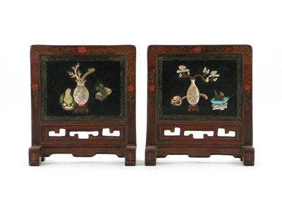 Appraisal: A pair of Chinese lacquer table screens inset with mother