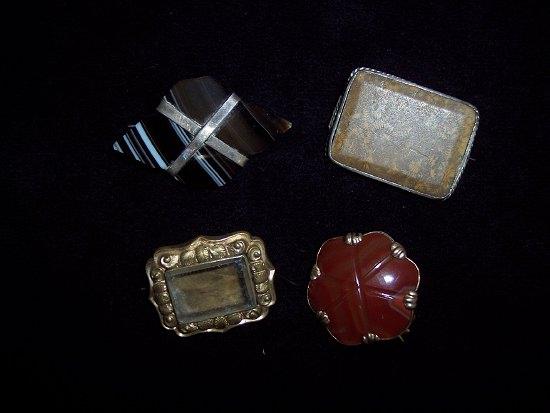 Appraisal: A striped agate brooch of lozenge shape and three other