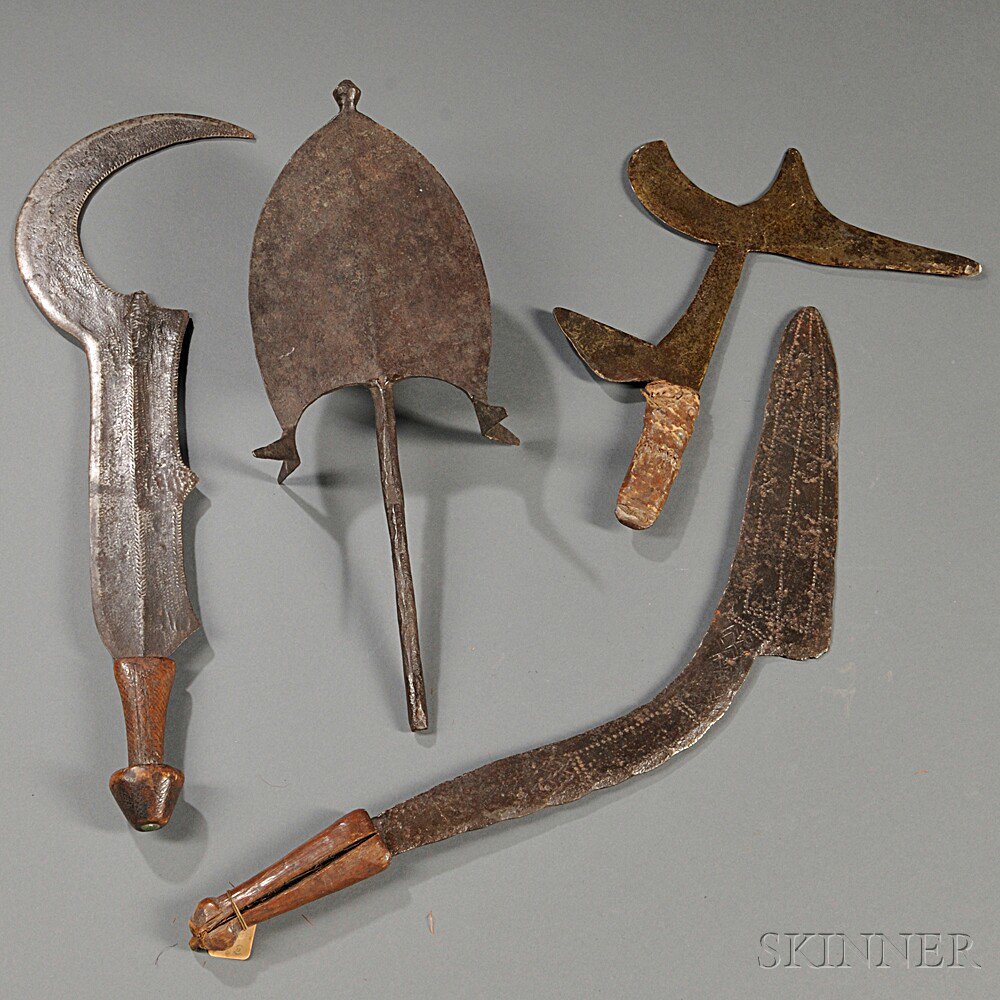 Appraisal: Four African Weapons th century two sickle forms with wood