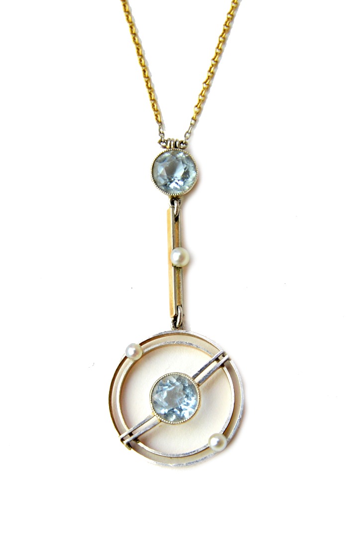 Appraisal: A gold aquamarine and seed pearl set pendant necklace the