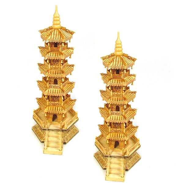 Appraisal: A pair of carved bone veneer pagodas height in width