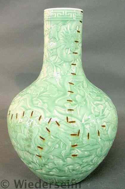 Appraisal: Massive celadon porcelain vase th c with raised floral and