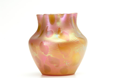 Appraisal: LOETZ Iridescent vase patterned with gold stylized leaves on wavy