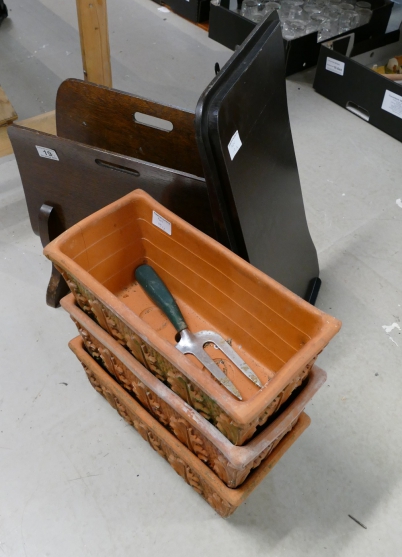 Appraisal: Oak Magazine stand trolley table and terracotta octagonal plant vases